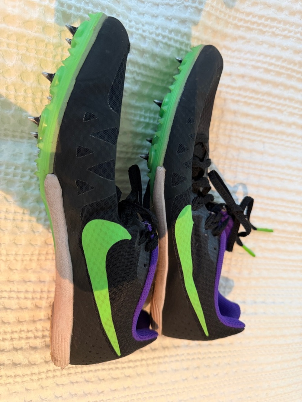 Nike Black Track Spikes with Neon Green Swoosh and Purple Lining